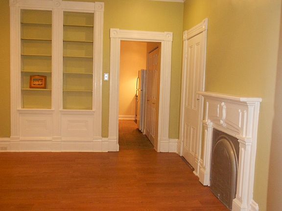 Built in shelving and fireplace