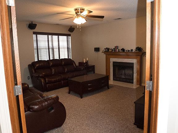 Beautiful french doors to a wood fireplace