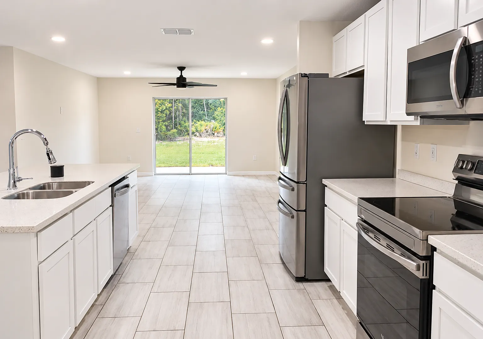 Beautiful four bedroom, two bath, two car garage and a half acre lot — Photo 3