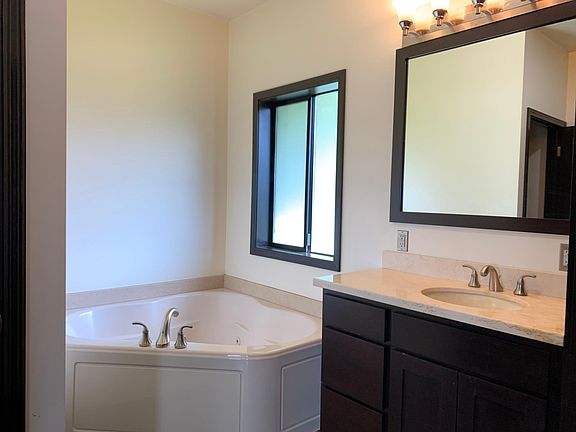 master bathroom included jacuzzi tub and good size stand up shower