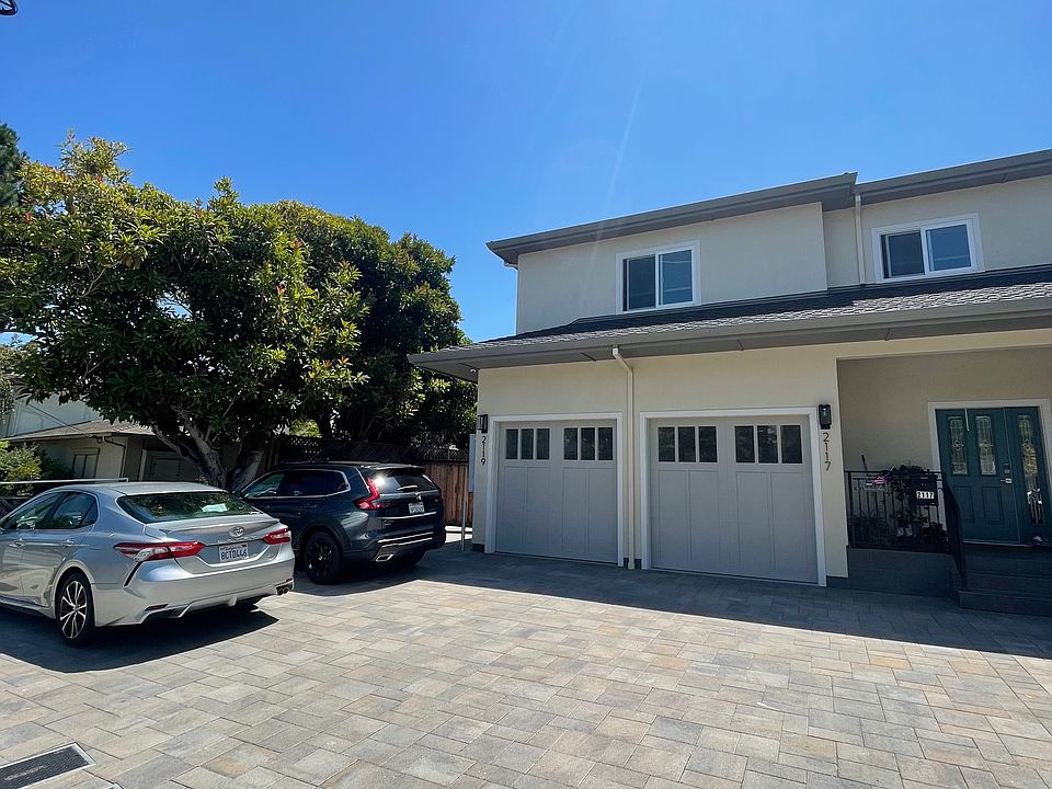 Front view of this Duplex. Two free parking spaces are available.