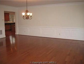 Separate Dining Room with upgraded crown and chair molding package.