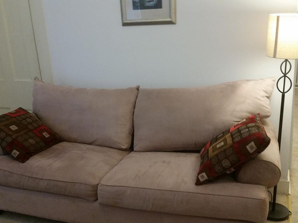 comfy sofa, 11 foot ceilings, ceiling fan