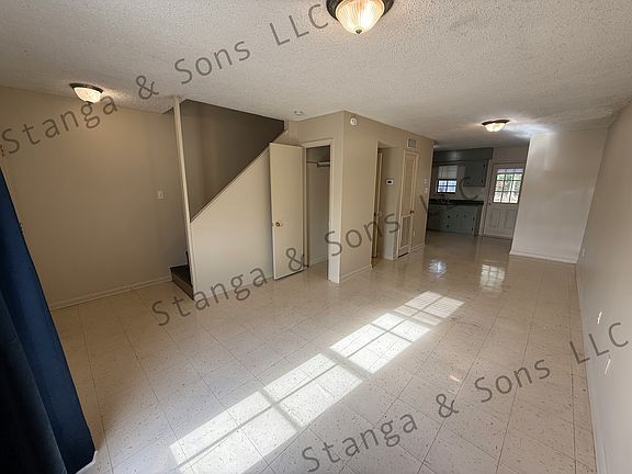 Living room with storage closet open