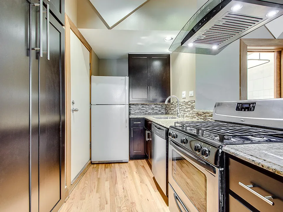 European Style Vent Hood Over Gas Range