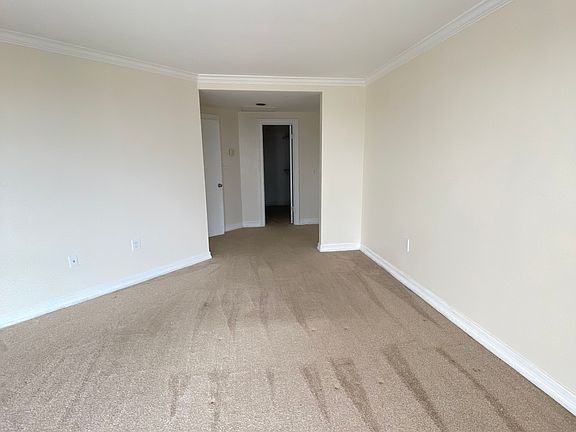 450 square feet Large Bedroom with extra nook for dressers. Brand new carpeting. Huge walk in closet!