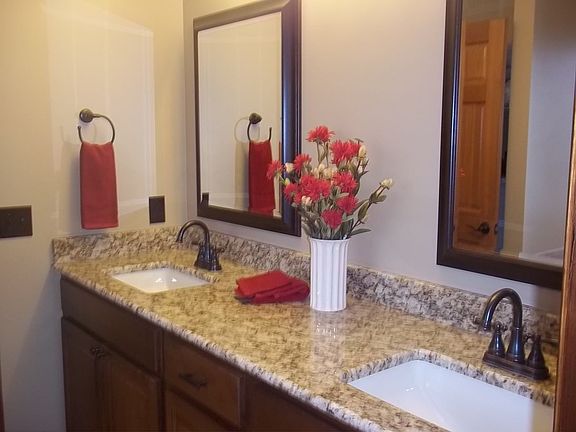 Granite countertop, plenty of cabinet storage.