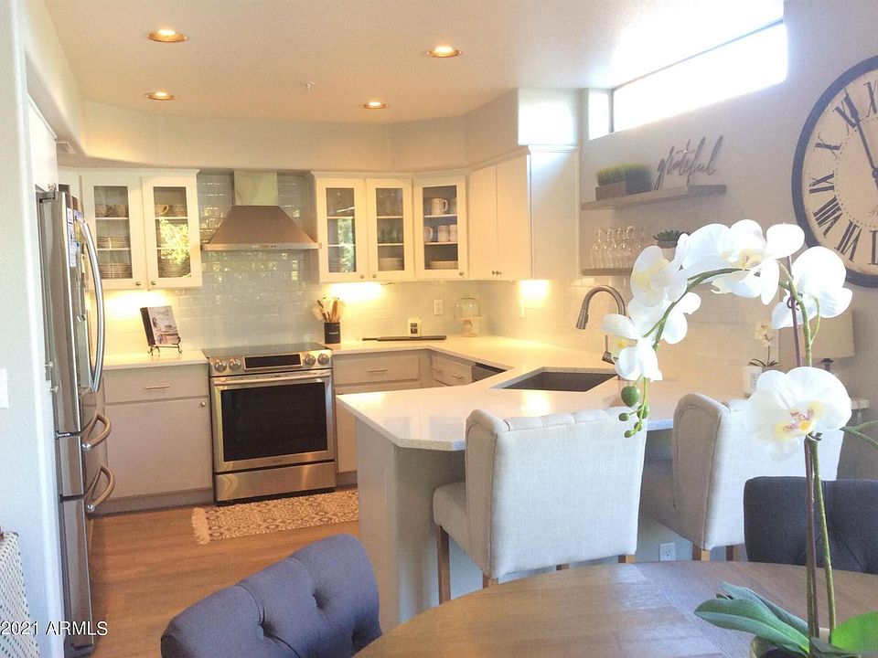 1st image of 7400 E Gainey Club Dr Unit 211