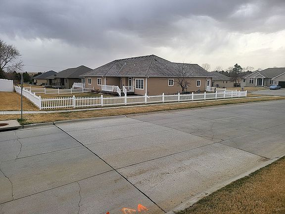 Big fenced in corner lot.