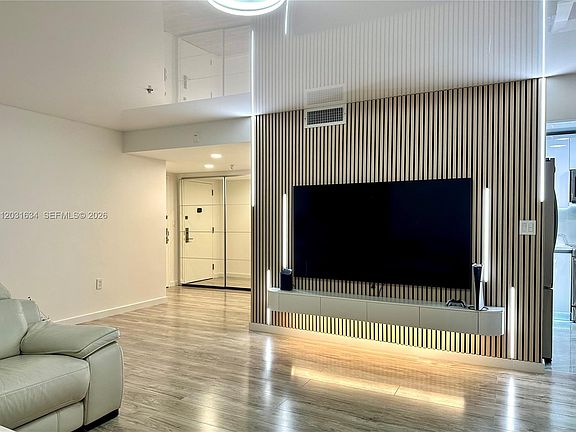 5th image of 671 NE 195th St APT 205E