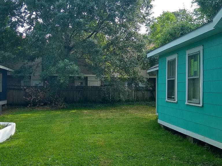 Big side yard with mature trees