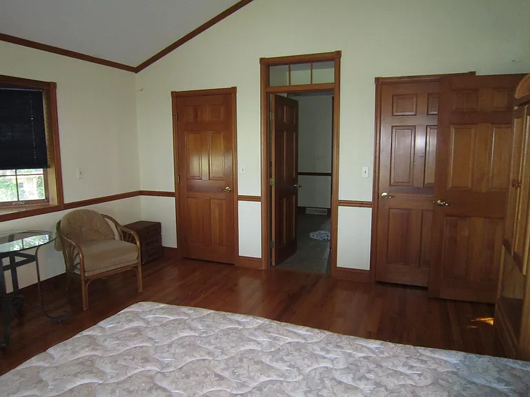 BR with Doors to Bath & Closets + Door to LR/Great Room on right