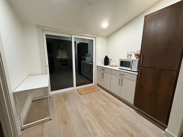 Pantry area leading to back porch.