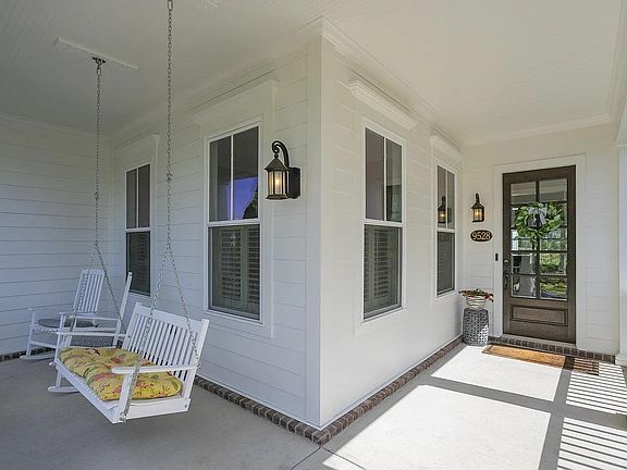 Enjoy iced tea on the porch swing!