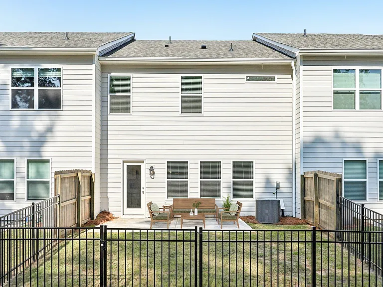 Alternate view of the patioan inviting space ideal for relaxation and outdoor enjoyment.