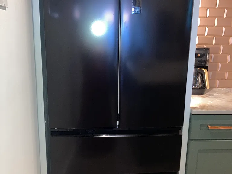 Stylish French door refrigerator with modern design.