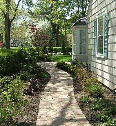 Brick walkways with park like landscaping