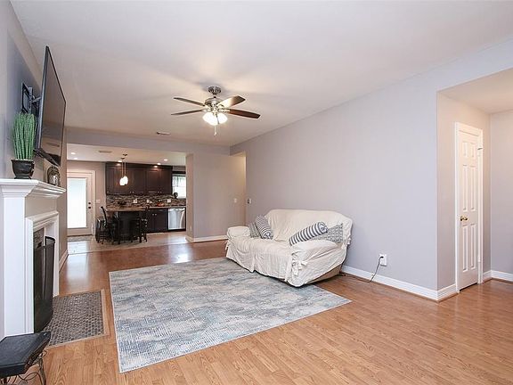 This light and bright spacious living room is the perfect layout for entertaining or just relaxing! Whether it's simply a night in or entertaining family and friends, this home has ample open space for everyone to enjoy!
