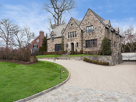 Substantial and Impressive Architecture. Stunning Curb Appeal. Circular Drive. Gated Garage Courtyard. Oversized 3 Car Garage.