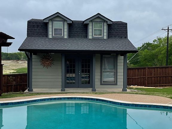 Pool House of Home Office with large loft for storage.