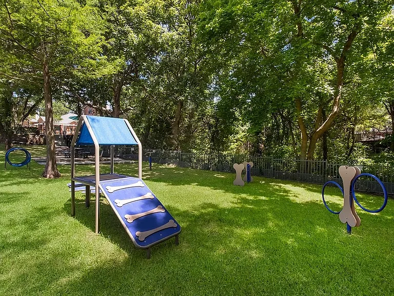 Fetch, play, and socialize at our apartment's dog park