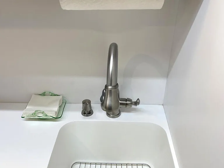 Integrated CORIAN Sink with S/Steel Dish Rack, Gooseneck Faucet, Soap Dispenser, Paper Towel Holder, & Waste Basket
