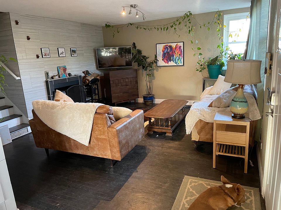 Entryway and living room. I love to have many plants around the house.