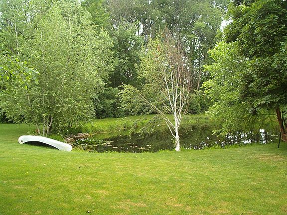 Stocked Pond with Fountain