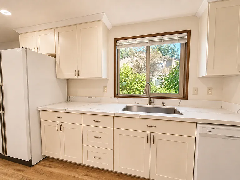 Kitchen overlooking the side yard