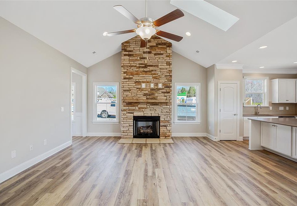 Optional stone to ceiling fireplace surround