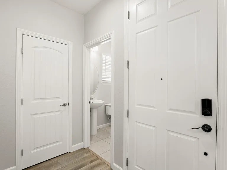 Downstairs washroom and entry closet.