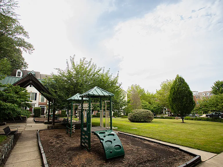 Quiet family oriented neighborhood, playground right by the front door, lots of greenery