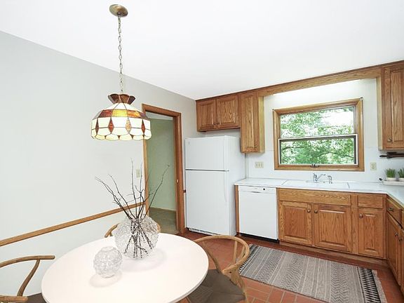 Large eat in kitchen with tons of counter and cabinet space.