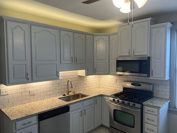 Updated Kitchen includes new appliances & granite tops