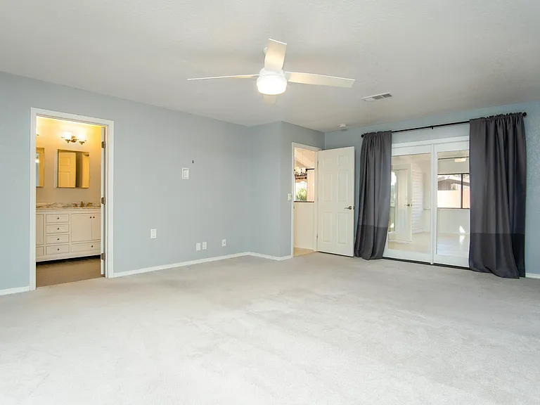 Massive main bedroom. King bed fits easily with ample space for dresser, nightstands, sitting area and more