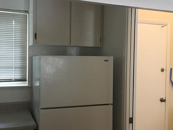 kitchen to the right of front entrance