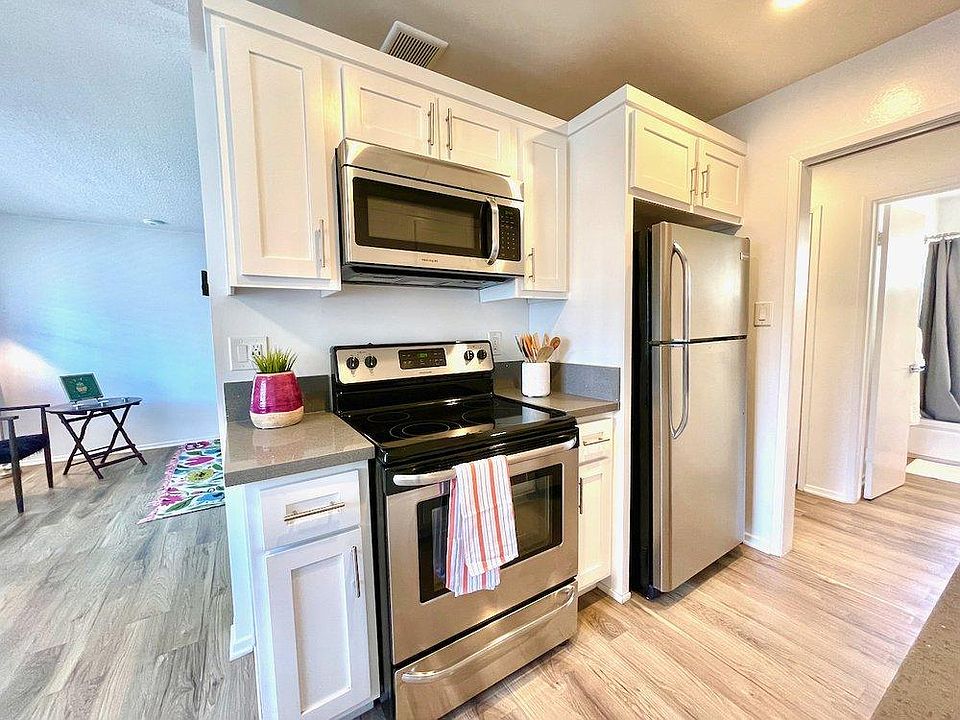 Staged Updated Kitchen - Including Microwave, Refrigerator and Stove