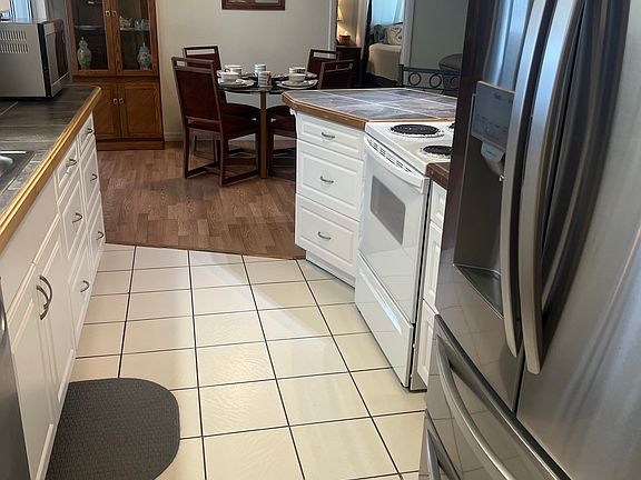 Kitchen with new Refrigerator and Dishwasher