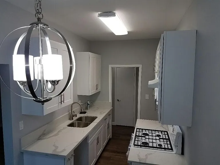 Hallway closet and kitchen