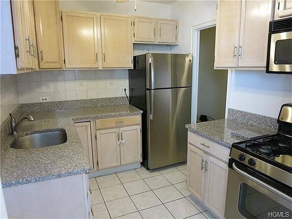 Updated Kitchen with granite and ss appliances.  Brand new refrigerator