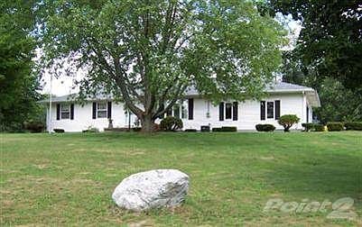 Beautifully remodeled home sitting atop the hill overlooking large pond, 10+ acres and some woods with Tamarack Creek running thru it. Wildlife paradise on corner lot.