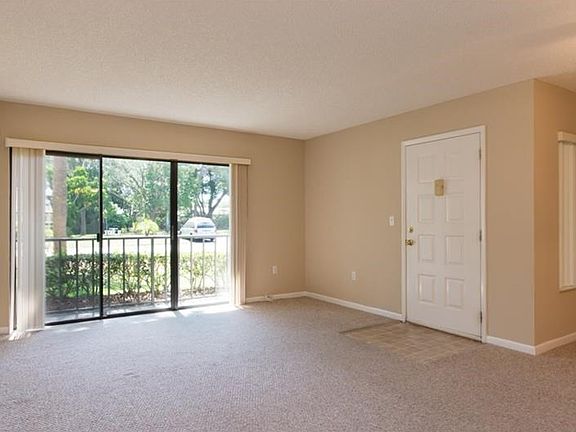 SPACIOUS LIVING OPENS TO THE PATIO