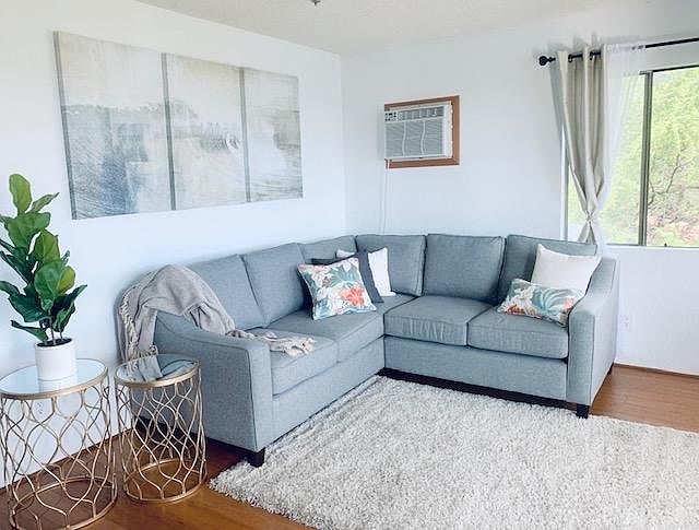 Living room with an abundance of natural light and ocean view