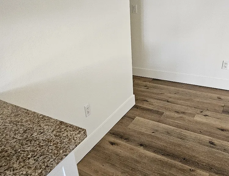 From kitchen going to living room, hallway
