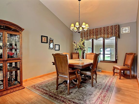 Dining room located off living room next to kitchen
