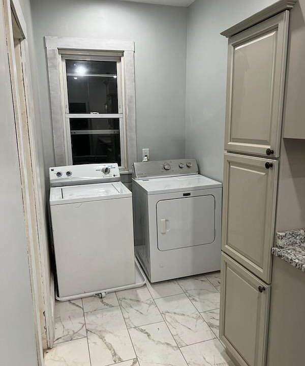 In-unit washer and dryer in kitchen area