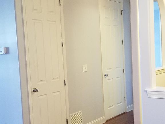 Hall, closet and powder room