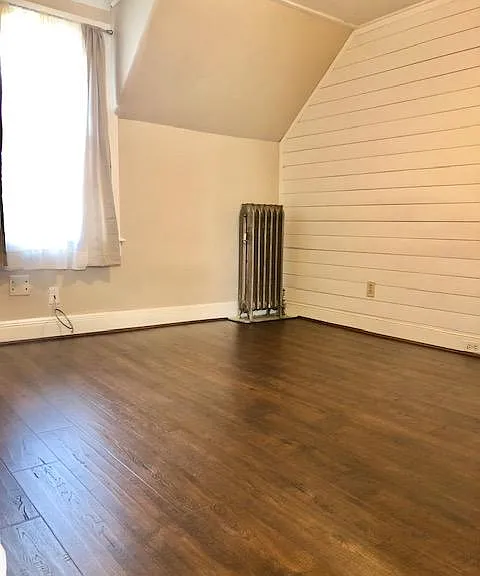Bedroom 2 with large closet and new hardwood floors