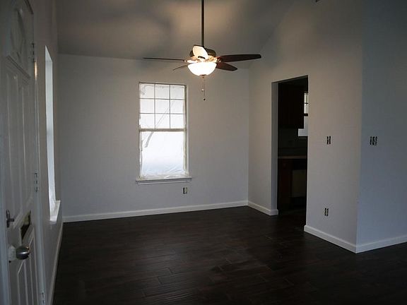 Dining room leading to kitchen