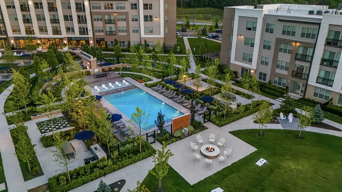 Relax in one of the many outdoor courtyards, surrounded by lush landscaping - Hanover Colony Place
